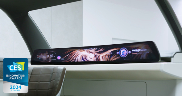 Inside the car with LG Display's CES 2024 Innovation Award-winning high-resolution peer-to-peer display with a curved design. The digital interface is elegantly spread out.