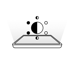 태블릿 화면 위로 빛을 발산하는 원과 이를 둘러싼 빛나는 효과가 있으며, 이것은 고휘도 특징을 나타낸다.